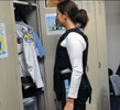 Photo 3 - female officer demonstrates fit of bulletproof vest